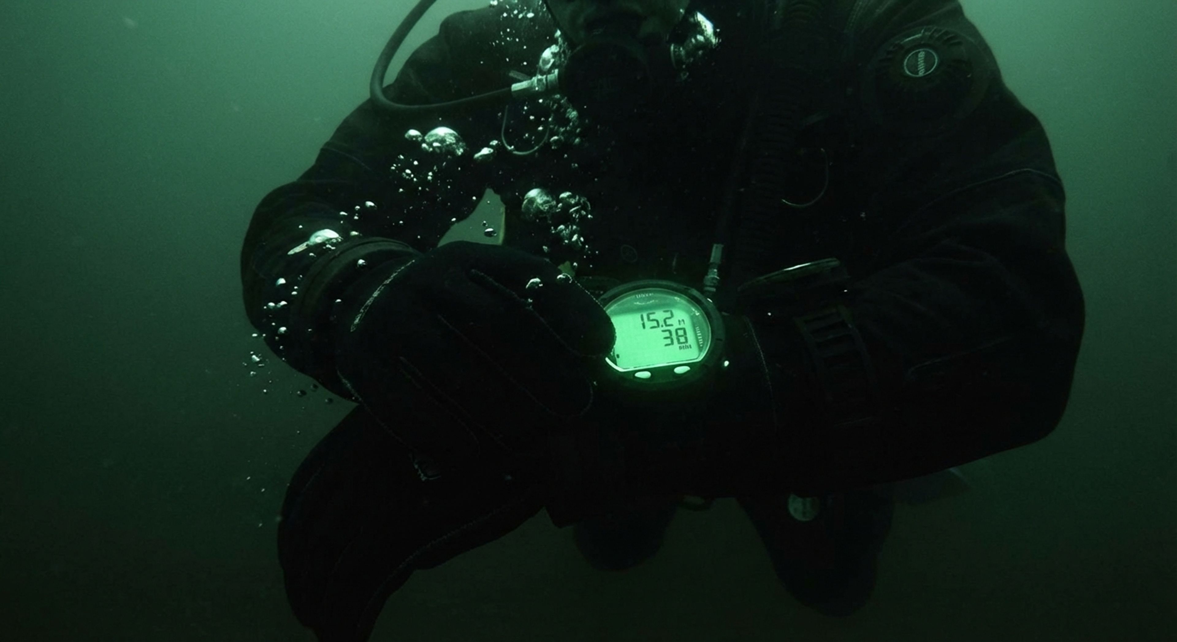 Diver checking gauges