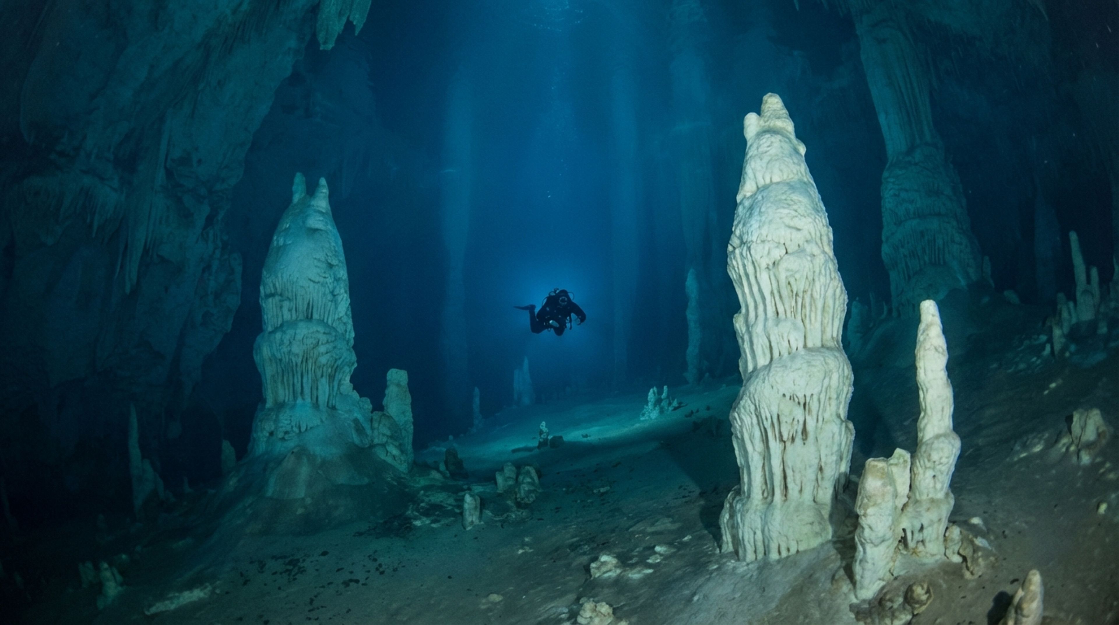 Cave diver in halocline